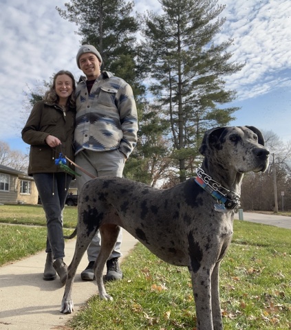 Carlyn with her family and dog.