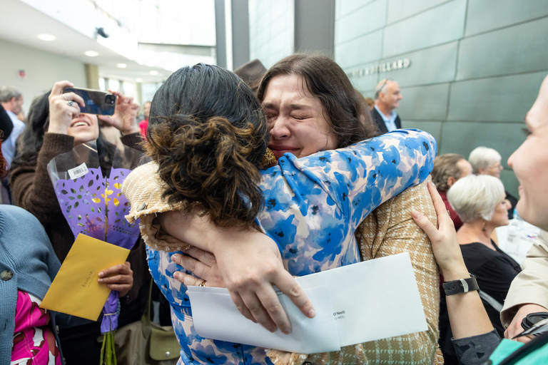 MD program graduate hugs their family after matching on match day 2026.