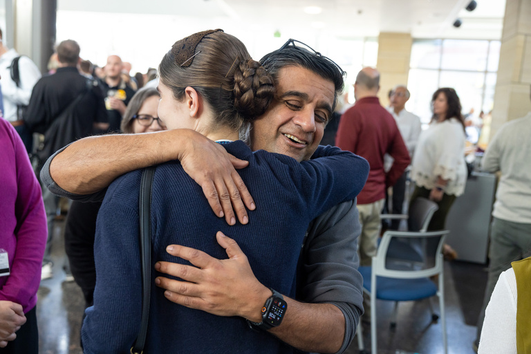 MD program graduate shares an emotional hug on match day 2026.