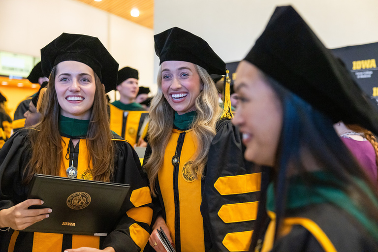 MD graduates celebrate the MD commencement ceremony together.