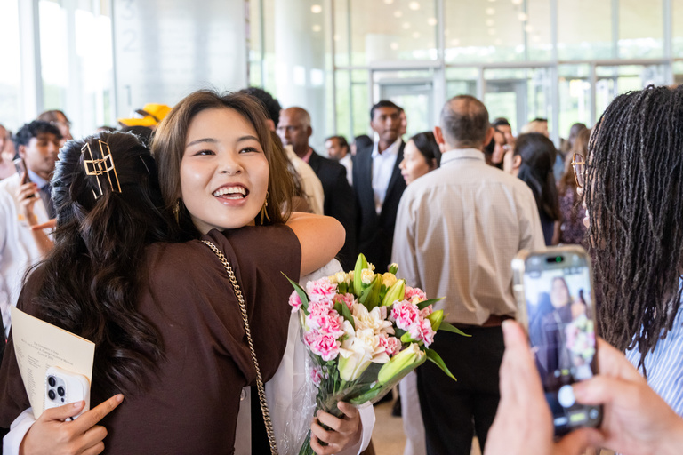 Student in an emotional hug.