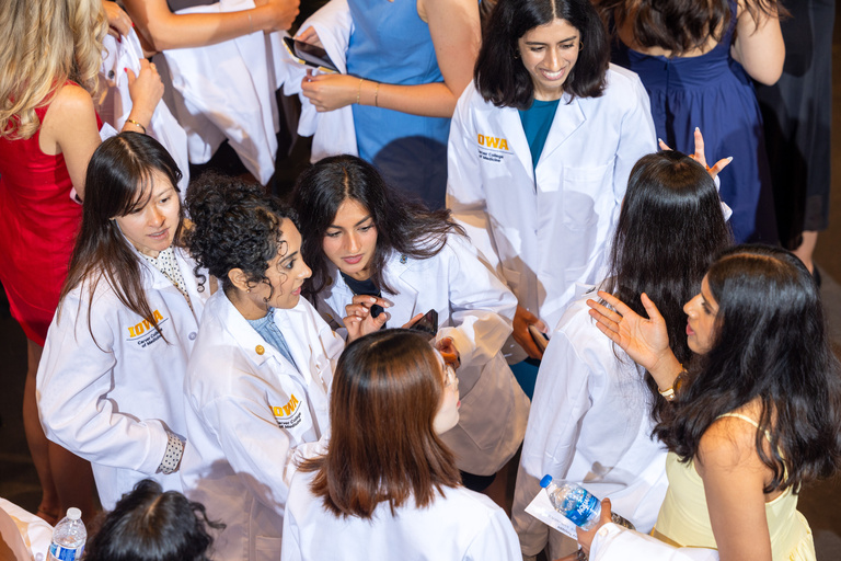 MD white coat students celebrate the White Coat Ceremony. 
