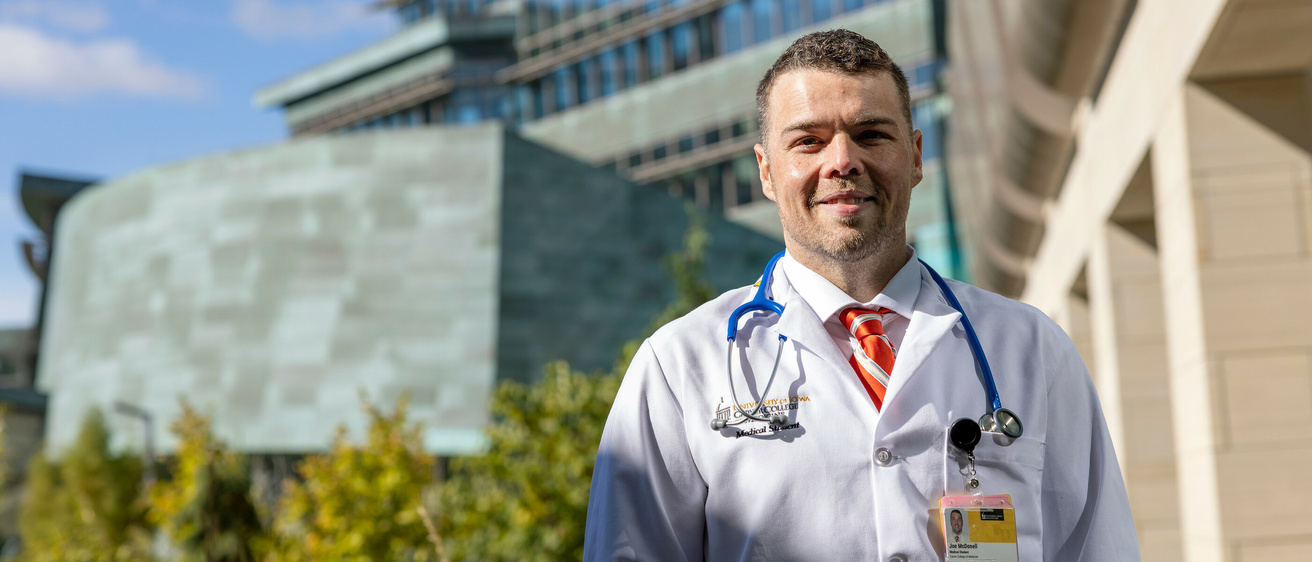 UI Carver College of Medicine first-year medical student Joe McDonell, photographed on Monday, Oct. 25, 2021. McDonell grew up in Coggon, and delayed higher education to help his mother. A father of two, McDonell is currently conducting neonatal research and wants to become a neonatal intensivist.